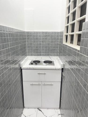 3-in-1 Stylish City Condo with Private Rooftop for Guest and Guest Visitors Only in Amasaman