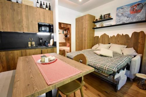 Shared lounge/TV area, Silvana 07 Charme Studio MhD in Madonna di Campiglio City Center