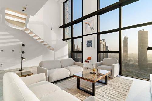 FIRST CLASS 2BR Elegant Duplex Haven, Dubái