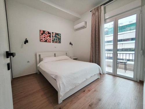 Center Athens all new and fully equipped 2 bedrooms 82 sqm big sea view apt close to Acropoli with Lift, Athens