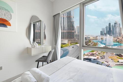 The Grande Signature Experience Modern 2BR with Incredible Views of Burj Khalifa & Dubai Fountain, Steps Away from Dubai Mall