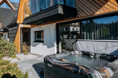 Unterkunft von außen, Harenda Apart Ski&Spa - luksusowe domki z sauną, jacuzzi i klimatyzacją (Harenda Apart Ski&Spa - luksusowe domki z sauna, jacuzzi i klimatyzacja) in Guty