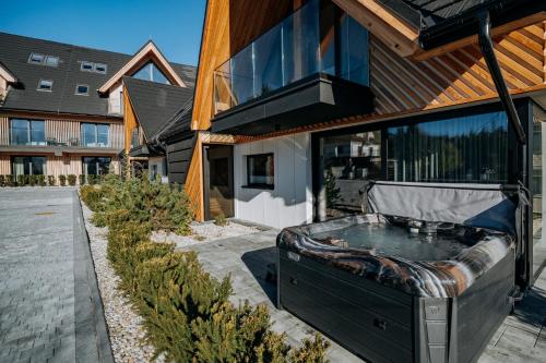 Unterkunft von außen, Harenda Apart Ski&Spa - luksusowe domki z sauną, jacuzzi i klimatyzacją (Harenda Apart Ski&Spa - luksusowe domki z sauna, jacuzzi i klimatyzacja) in Guty