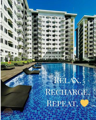 Swimming pool, Brand New 2BR Condo in Charm Residences  in San Isidro