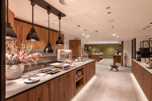 Ételek és italok, AlpenParks Hotel & Apartment Taxacher in Kirchberg in Tirol Városközpont