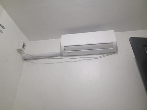 1 Bedroom Townhouse with Airconditon ,Water heater and free wifi,fully furnished in Angono