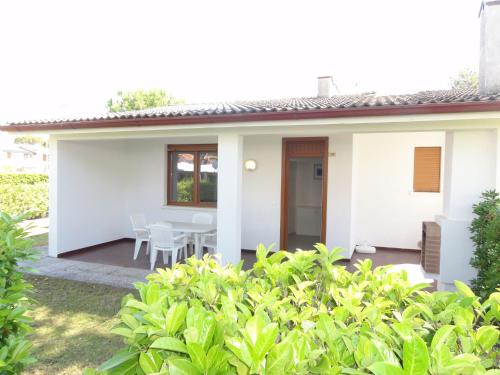 Terraced villa with garden and pools