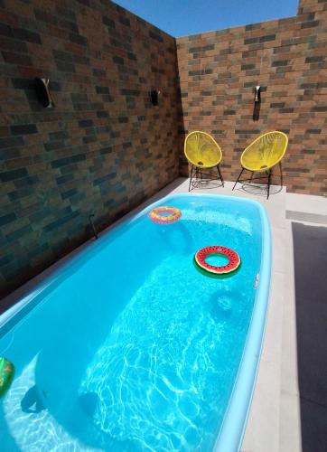 Casa Amarela da Prainha de Mambucaba - Piscina aquecida a 40 graus – khách sạn tại Pontal