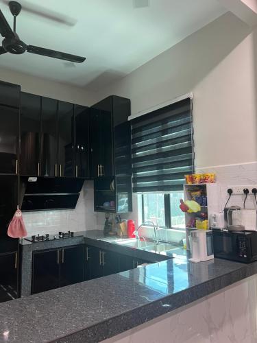 Kitchen, The Aireez Homestay in Dungun