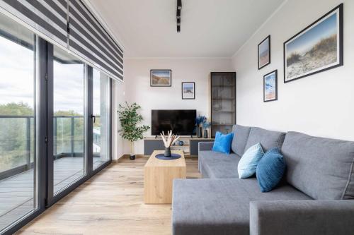 Comfortable Apartment with Parking & Balcony Ideal for Families by Nolcegi Renters – khách sạn tại Panewniki