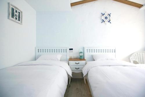 Chambre avec 2 lits, vue sur la ville