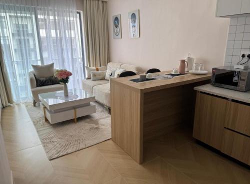 1BR Luxury suites near JKIA SGR with pool gym Cityview – khách sạn tại Mugunoini