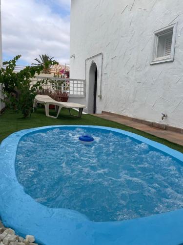 Apartamento con jardín y pequeña piscina privada para refrescarse chambre d'hôte Maspalomas
