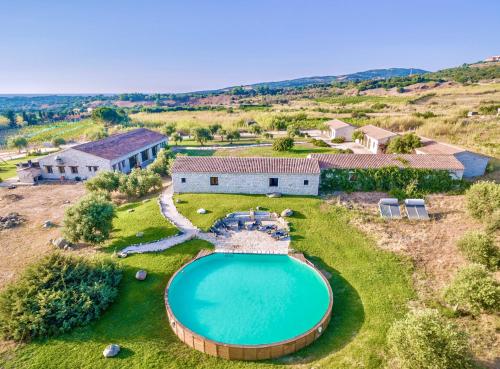 Lofts with private outdoor area and swimming-pool in Badesi, Badesi (foto 6)