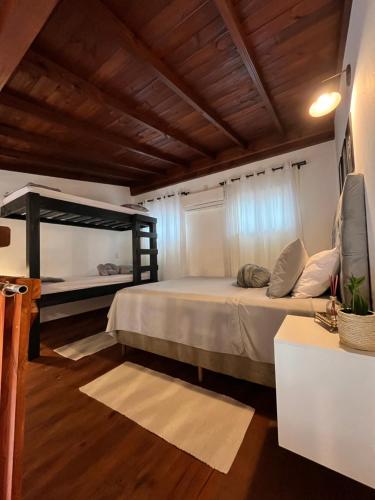 Chale aconchegante da ilha in São João do Rio Vermelho