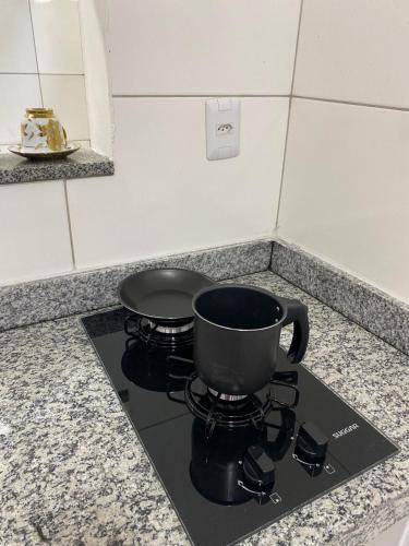 Apartamento Rubra- Rústico, Moderno e Home Office (Apartamento Rubra- Rustico, Moderno e Home Office) in ซานโตอันตานีโอ เด เจซูส