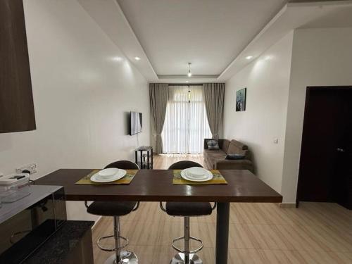 keuken, Bright & Modern 1-Bedroom Apartment at Pearl Marina in Lyamutundwe