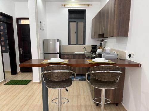 keuken, Bright & Modern 1-Bedroom Apartment at Pearl Marina in Lyamutundwe
