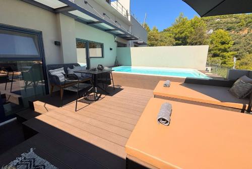 陽台/露台, Entire house - 2br Suite White gea with private pool in 瓦西里亞斯 - 費特利亞