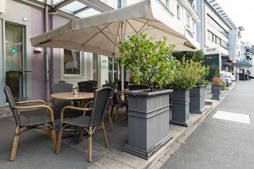ห้องอาหาร, Garner Hotel Post Aschaffenburg by IHG in อชาฟเฟนบูร์ก