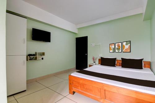 Collection O Jalpaiguri Formerly Greater Kailash