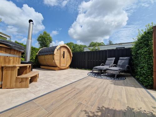 Kert, TETchalet met wellness tuin in Koggenland