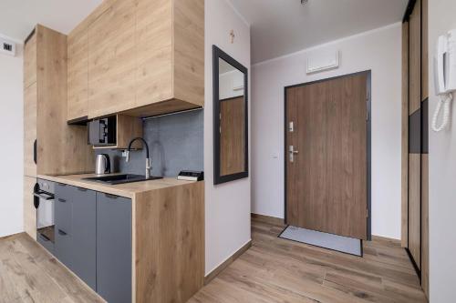 Instalações, Stylish Apartment with a Balcony Ideal for Remote Work by Noclegi Renters in Panewniki