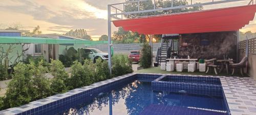 라용 อู่ตะเภาโฮมสเตย์byต้นไทร 2성급 호텔 로비