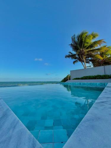 Flat StudioMar - beira mar até 4 p - pé na areia (Flat StudioMar - beira mar ate 4 p - pe na areia) in 科魯裡皮