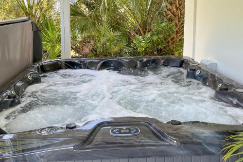 Walk to Wabasso Beach Home with Hot Tub and Bikes in Wabasso Beach (FL)