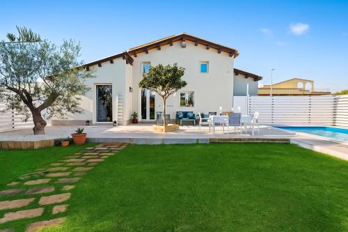 ทัศนียภาพภายนอกโรงแรม, Incantevole villa con piscina e giardino a poca distanza dalle spiagge piu belle in กิอูซา ดี การ์โล