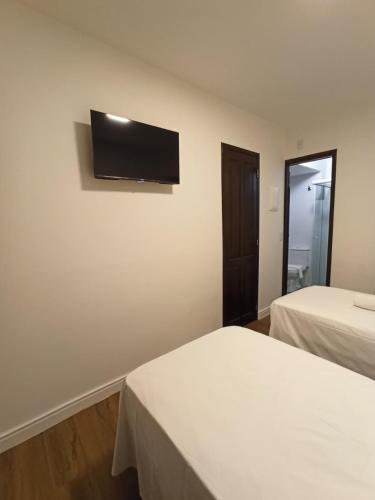 1 double bed, 3 twin beds