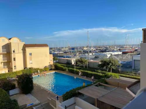 Zwembad, T3 Expo Sud-Est - Parking - Piscine - Clim - Wifi in Gruissan City Center