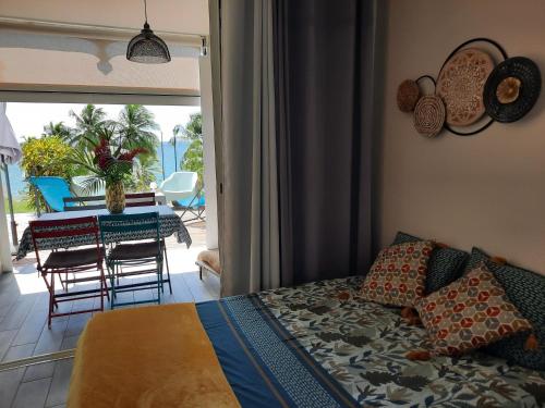 Turquoise studio remarquable vue mer in เลอ ยามัน