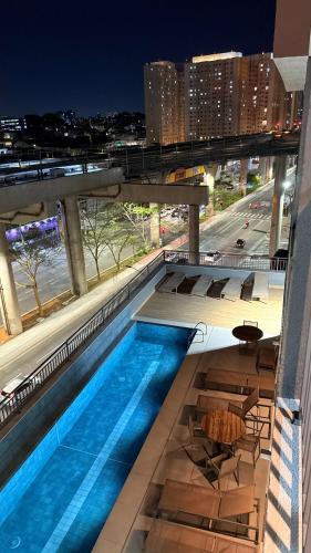 Swimming pool, Timber One - Apto com varanda e Facil acesso ao Metro e Expo Imigrantes near Praça Joaquim Lopes Guimarães