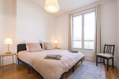 Eiffel Tower View 3BR Balcony - image 11