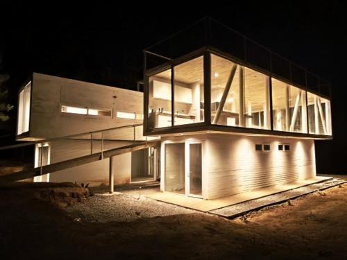 Concrete house overlooking the ocean and beach access