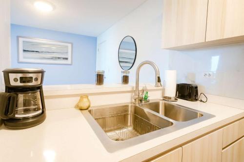 Beachfront 1BR Apt in Marbella del Caribe Isla Verde - main image