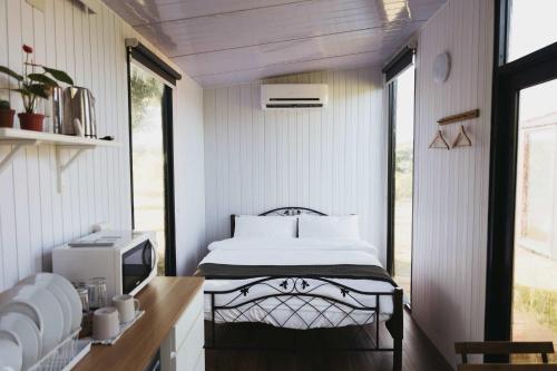 Exterior view of Happy Farmer House X by Tiny Away