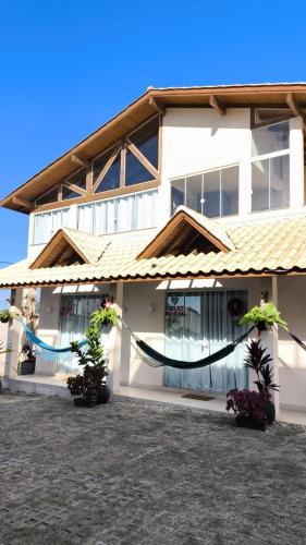 Hospedagem MAR SANTO in Santinho Beach