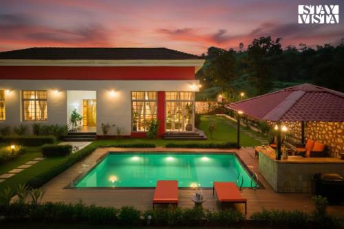 StayVista's Rustique Radiance - Hillside Retreat with Outdoor Pool & South Indian Architecture - Khopoli