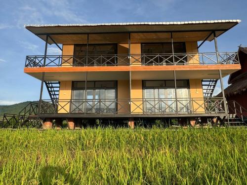 ເຂົ້າໜຽວຟາມສະເຕ-Kao Niaw Farmstay - Nan