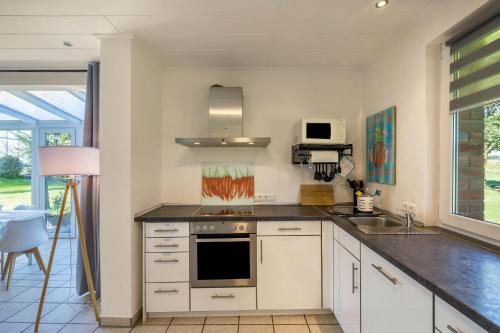 ห้องครัว, mit Wintergarten nah Moviepark in บอททรอพ