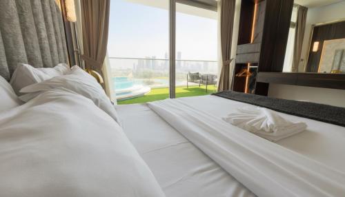 Highend Azure 1BR Sea View and Private Beach with Pool Access, Dubaï (photo 4)