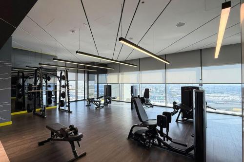 Cozy 2BR Aykon City Near Downtown - Pool and Gym - image 2