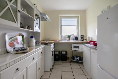ห้องครัว, Ferienwohnung Postel in เมลดอร์ฟ