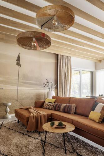 Koplietošanas atpūtas telpa ar TV, HYGGE Golf House in Pętkowice