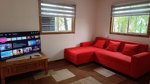 Közös társalgó / TV, Kabañas Bosque De Alamos (Kabanas Bosque De Alamos) in Puerto Aisen