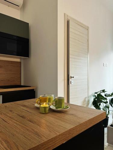 Domus Jota - Comfort e Stile in Suite Indipendente