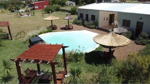 Complejo "La Roca" - Cabanas y Hospedaje in Col. Caseros